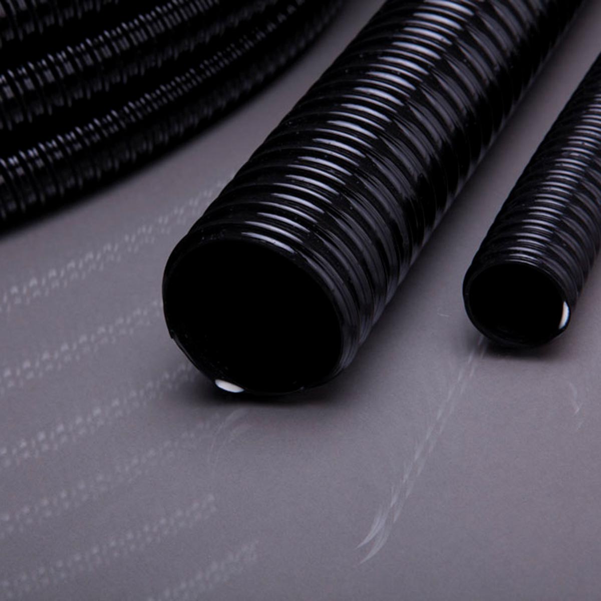 Saug-/Druckschlauch Zuschnitt, aus PVC, schwarz, L 30 m, d 19 mm, D 23.8 mm Saug-/Druckschlauch Zuschnitt, aus PVC, schwarz, L 30 m, d 19 mm, D 23.8 mm